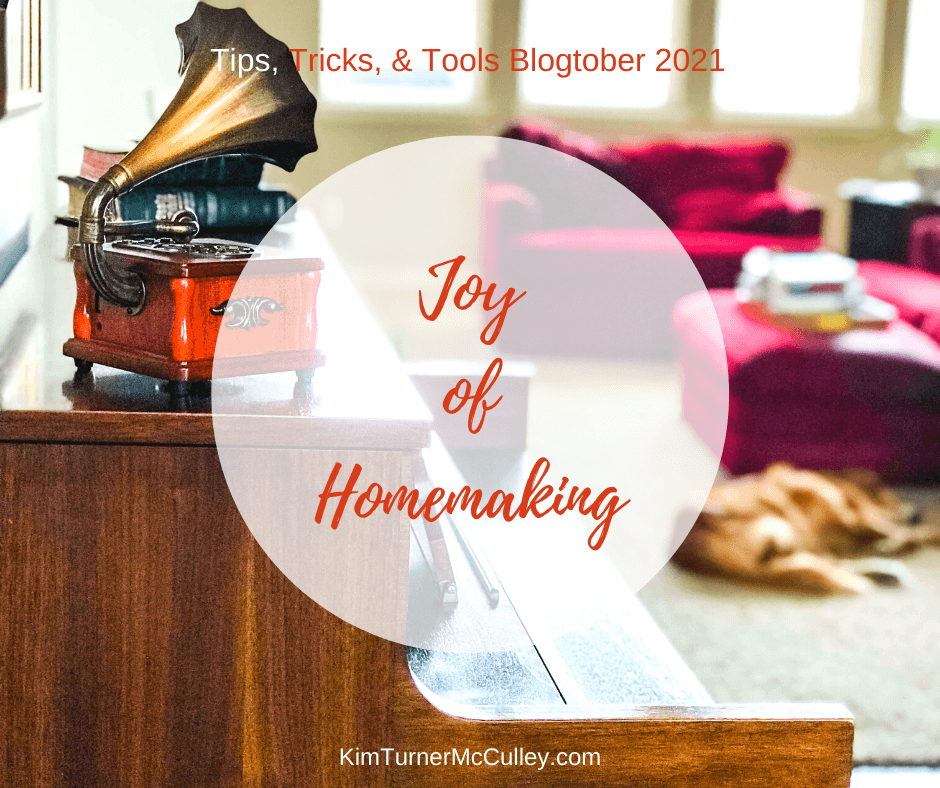 Joy of Homemaking Tips, Tricks & Tools Blogtober 2021 KimTurnerMcCulley.com 
Photo of red couch, shiny piano, sleeping dog